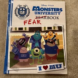 Disney Pixar Monsters University Yearbook with Blue and Red Accents